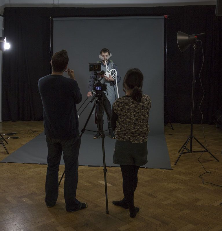 Artists Burton and Nitta in a studio photo shoot 